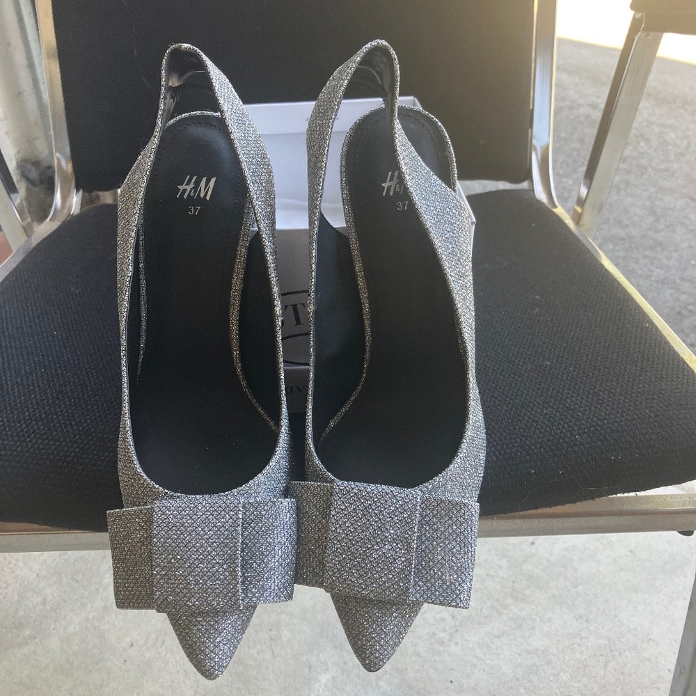 Sparkly silver high heel sling back